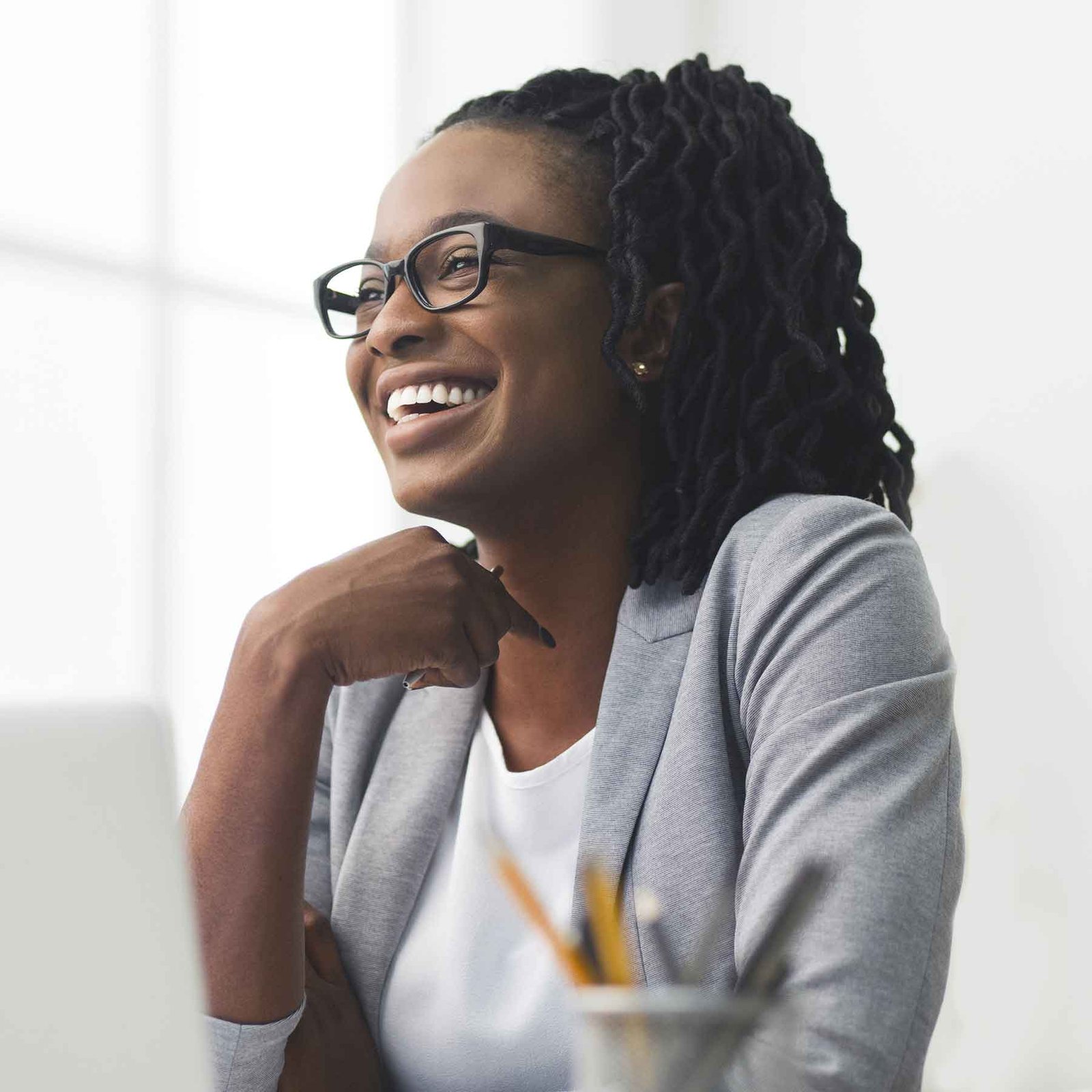 african-american-businesswoman-laughing-sitting-ag-2021-04-02-20-24-32-utc.jpg